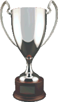 a silver trophy with a wooden base and a plaque