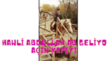 a picture of a boy riding a horse with the words hawli abdullah ab gelyo