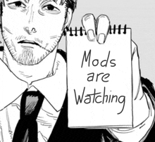 a man in a suit and tie is holding a piece of paper that says mods are watching