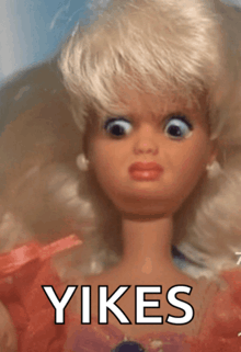a close up of a barbie doll with the word yikes written on the bottom