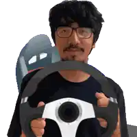 a man wearing glasses is holding a steering wheel in his hands