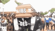 a group of men are carrying a coffin with the word ibs on it