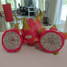 a dragon fruit has a sticker on it that says ' dragon fruit ' on it