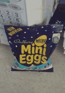 a bag of cadbury mini eggs is sitting on a counter