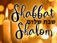 a picture of two lit candles with the words shabbat shalom written on it .