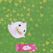 a pink animal crossing card with a white ghost on top of it