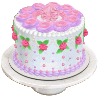 a white cake with pink and purple frosting and flowers on it