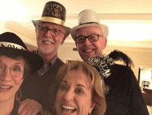 a group of people wearing new year 's eve hats