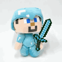 a stuffed minecraft character holding a pixelated sword