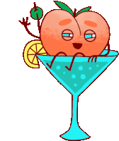 a peach is sitting in a martini glass