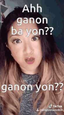 a woman is making a funny face with a caption that says ahh ganon ba yon ?