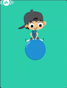 a boy in a baseball cap is sitting on a blue bouncy ball .