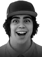 a young man wearing a baseball cap with the word fox on the front