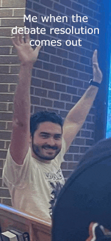 a man with his arms in the air and a caption that says me when the debate resolution comes out