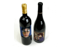 two bottles of wine one of which has a picture of a boy on the label