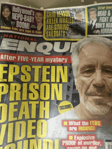 a national enquire magazine with a picture of epstein prison death video