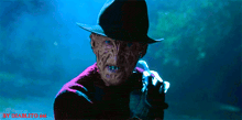 a nightmare on elm street freddy krueger is holding a knife