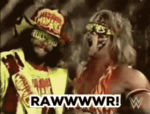 two wrestlers are standing next to each other with the words rawwwwr on the bottom right