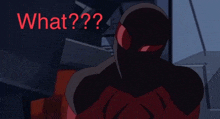 a red and black spiderman is standing in front of a sign that says " what "