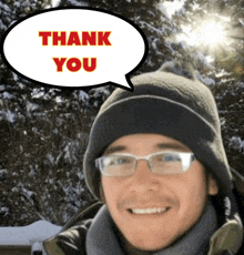 a man wearing a beanie and glasses says thank you in a speech bubble