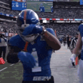 a football player with the word gezy on the back