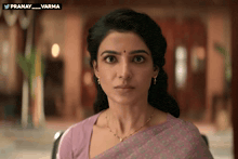 a close up of a woman 's face with the hashtag pranay_varma on the bottom