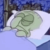 a cartoon character is sleeping in a bed with a pillow and blanket .