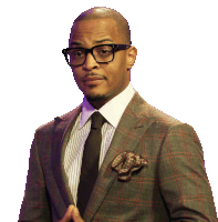 a man in a suit and tie with glasses