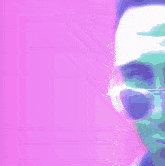 a close up of a person wearing sunglasses on a pink and purple background