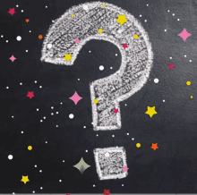 a question mark is drawn on a blackboard with chalk