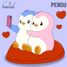 two penguins are sitting on a red pillow and one is taking a picture of himself