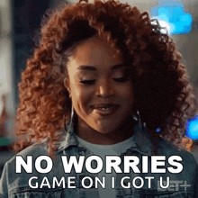 a woman with curly hair is smiling and saying `` no worries game on i got u ''