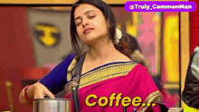 a woman in a pink saree is holding a pot of coffee and saying coffee .