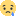 a yellow smiley face with a sad look on its face and a blue tear coming out of it .