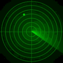 a green radar screen with a green circle in the middle of the screen .