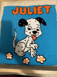 a picture of a dalmatian dog with the name juliet on the bottom
