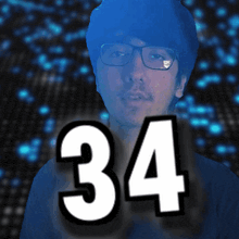 a man with glasses and the number 34