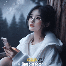 a girl wearing glasses is looking at her phone with situs slot gacor in the corner