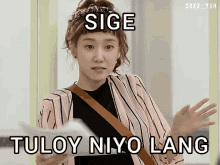 a picture of a woman with the caption ' sige tuloy niyo lang ' on the bottom