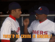 two baseball players talking in a dugout with the words " there 's no crying in baseball " above them