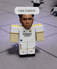 a soccer player with a speech bubble that says hala madrid on it