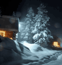 a snowy scene with a cabin in the foreground and trees in the background