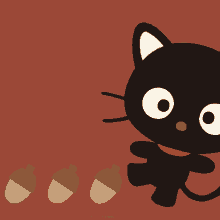 a black cat is standing next to three acorns on a red background ..