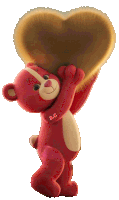 a red teddy bear is holding a brown heart with the letters b.c. on its chest