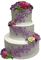 a white cake with purple and pink frosting on it