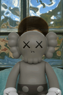 a stuffed animal with a x on it 's eyes