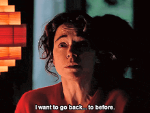 a woman in a red sweater says i want to go back to before