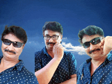 a man with glasses and a mustache wears a blue shirt