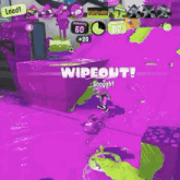 a person is playing a video game with a purple background and a purple wall .