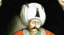 a painting of a man wearing a white turban and a mustache